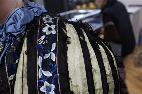 A Chinese pleated silk cape, converted from a skirt